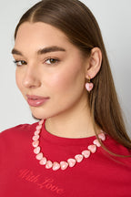 Oorbellen met hartvormige kralen