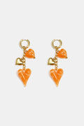 Oorbellen met hangende harten aan ketting