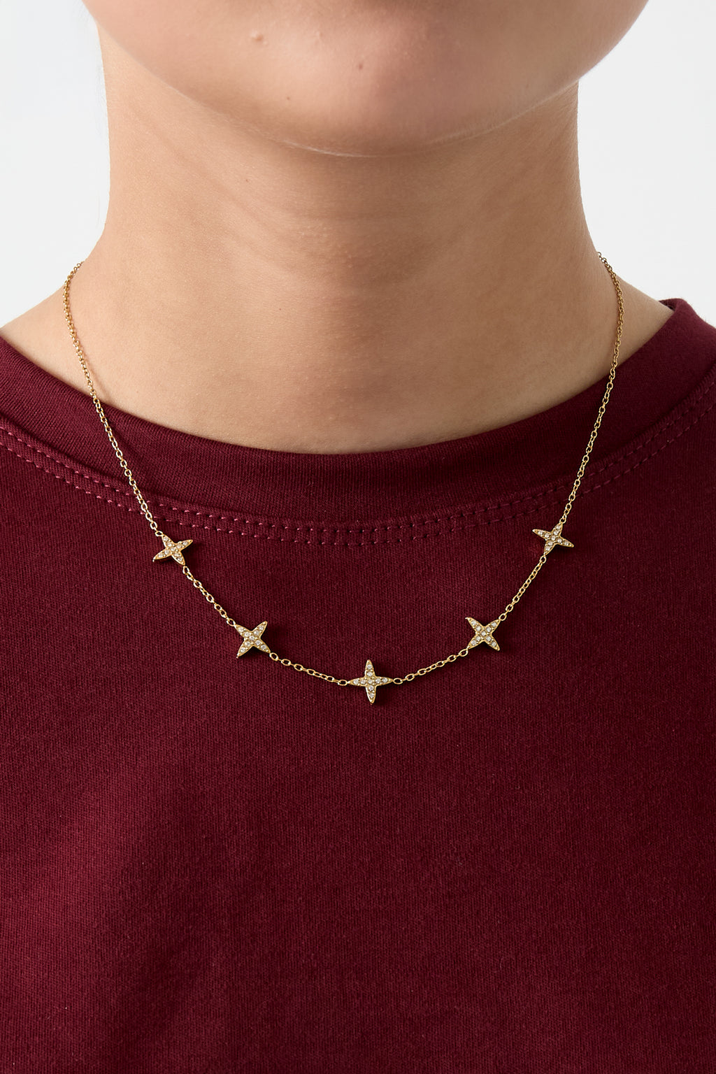 Ketting met klavermotief en belegde klavers