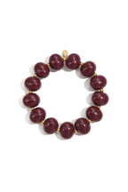 Elastieke kralenarmband met grote kralen - wijn rood